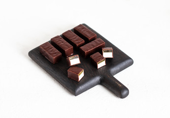 Souffle, jelly, souffle in chocolate, candy, chocolate candy with souffle, dessert, dessert in chocolate, fruit jelly, light background, sweets, Goodies, Goodies, loose, piece dessert, food, sweet foo
