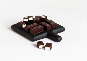 Souffle, jelly, souffle in chocolate, candy, chocolate candy with souffle, dessert, dessert in chocolate, fruit jelly, light background, sweets, Goodies, Goodies, loose, piece dessert, food, sweet foo