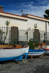 Fototapeta na wymiar colorful fishing boats in Catania, Sicily, Italy