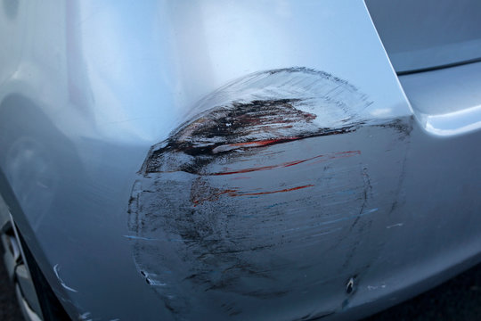 closeup of stratched car bumper