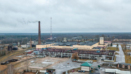 Aerial view smoking chimney of the gas boiler plant. Ecological problem.