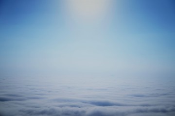 Naklejka na ściany i meble blue sky with clouds from air