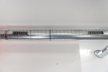 Vent system for indoor ventilation with metallic aluminum pipe and openings with grill for air...