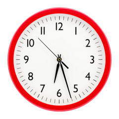 Clock with red round frame on white isolated background shows 6 hours 27 minutes_