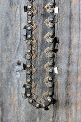 saw blade chainsaw wooden background