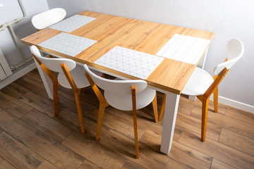 Wooden white dining table and four chairs