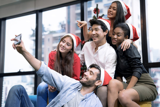 Group of friends taking a selfie, Merry Christmas and Year's Party.