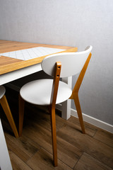Wooden white dining table and four chairs