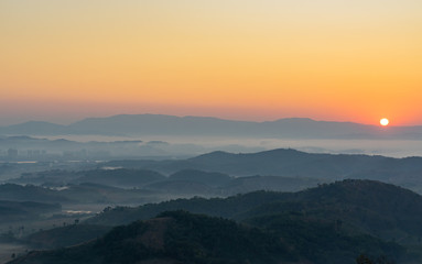 Fototapeta premium Morning misty mountain view at Ban Doi Sa-ngo Chiangsaen Chiangrai Thailand. which includes a view of the Golden Triangle covering Thailand, Laos and Myanmar.