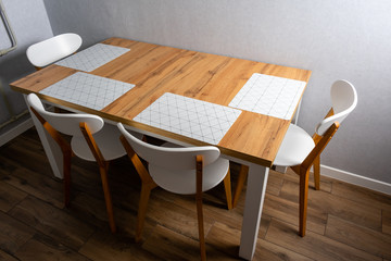 Wooden white dining table and four chairs