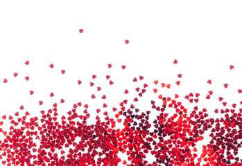 Red colored hearts on white background. Valentines day concept card. Place for text.