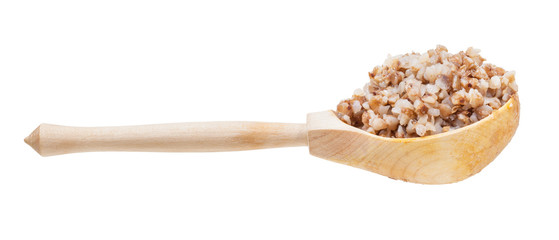 buckwheat porridge in wooden spoon isolated