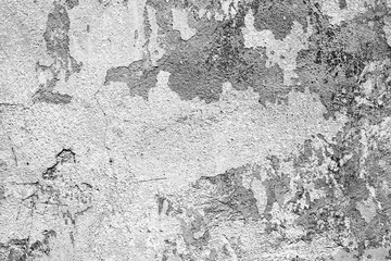 Texture of a concrete wall with cracks and scratches which can be used as a background