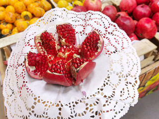 Broken pomegranate on a napkin