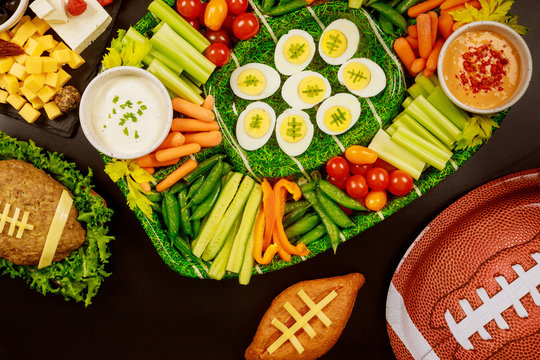 Delicious veggie with dipping and boiled egg for american football game.