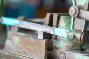 Fototapeta na wymiar Saw machine And cut the rectangular steel 