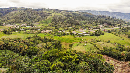 Fototapeta na wymiar Aerial view of a rural airport and a small town in San Vito, Costa Rica
