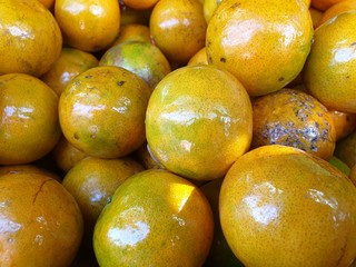 fresh orange at basket in front view