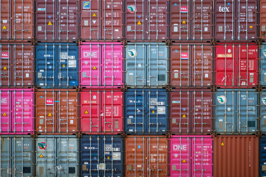 Stacked shipping container on freight harbour logistics centre in Hong Kong, November, 2019