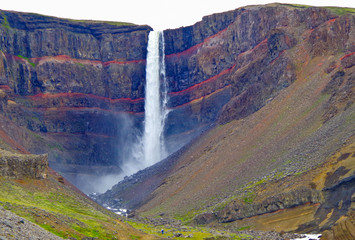 Impressive and breathtaking view onto Iceland´s fourth tallest or highest waterfall cascade...