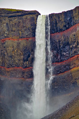 Impressive and breathtaking view onto Iceland´s fourth tallest or highest waterfall cascade...
