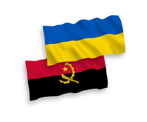 Flags of Angola and Ukraine on a white background