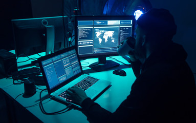 Hackers breaking server using multiple computers and infected virus ransomware. Cybercrime,...