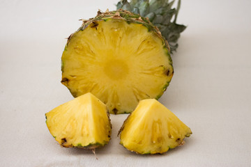 slices of pineapple on white background