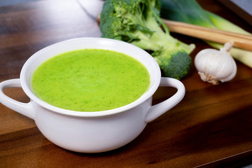 Delicious homemade green cream of broccoli soup with leek.