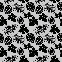 seamless pattern with tropical leaves in monochrome colors, simple ornament
