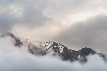 Fototapeta na wymiar Mountains in the clouds in Banff National Park Canada