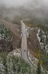 Mountain road through the clouds in the rocky mountains in Canada