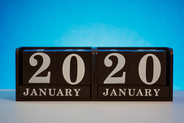 2020 happy new year concepts, the year 2020 written on wooden blocks with pretty colorful background with lots of copy space
