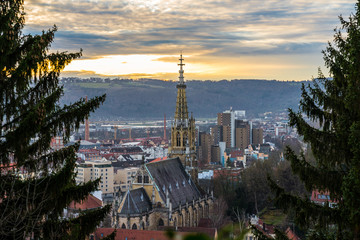 Obraz premium Germany, Famous frauenkirche church of medieval city esslingen am neckar from above with orange sky in winter season