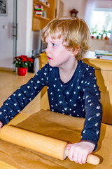 Child at the cookie baking