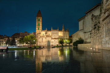 Valladolid, Spain. Church of Santa Maria La Antigua reflecting in water at dusk 