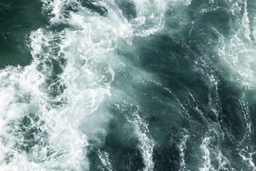 Obraz na płótnie Canvas Blue deep sea foaming water background 