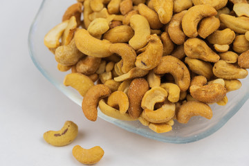 Cashews in a clear glass bowl. 