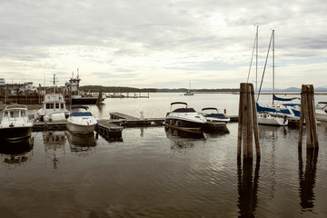 Boats docked along a harbor at Lake Champlain in Burlington, Vermont