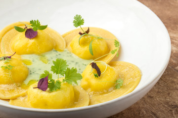 Ravioli on a plate, restaurant serving, close up.