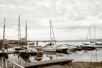 Boats docked along a harbor at Lake Champlain in Burlington, Vermont