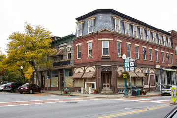 Small shops and restaurants on a cool Fall day in the historic New England town of Woodstock,...