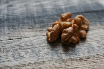 close-up of a walnut kernel on a wooden table