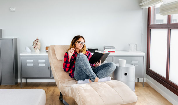 Woman reading at home