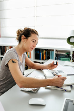 Writer woman at home