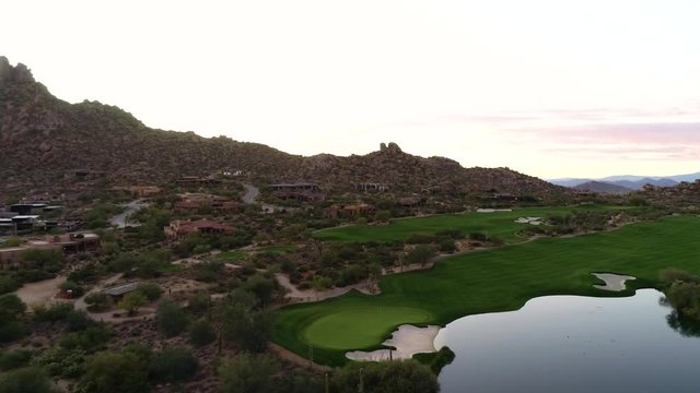 Aerial Pan From Estancia Golf Course To Pinnacle Peak
