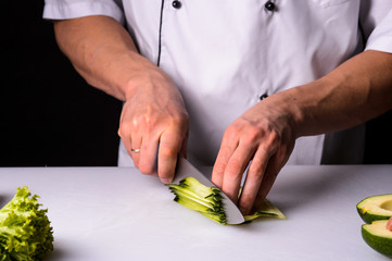 Chef cooks maki in stages