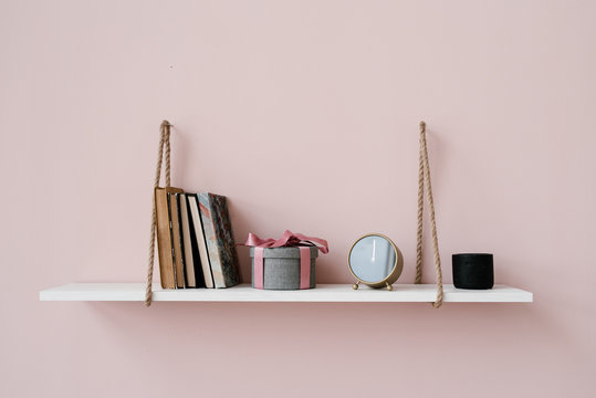 Stylish things on hanging shelf