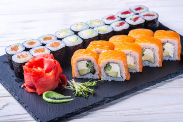 slices of sushi salmon on plate