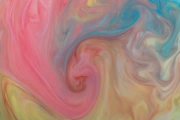 Abstract pastel colors in milk